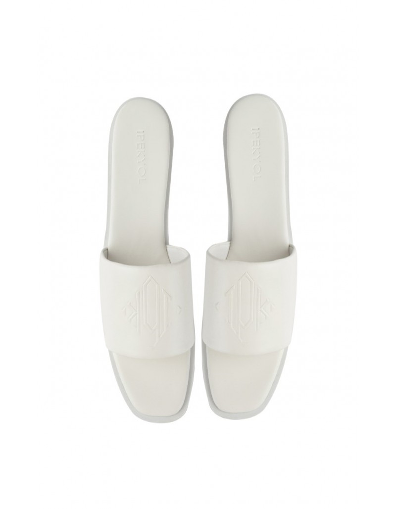 WHITE SLIPPER